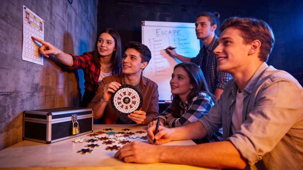 Participants actively engaged in an indoor escape room challenge, focusing on problem-solving and teamwork.