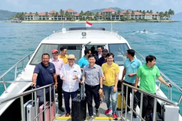 Corporate team boarding ferry to Bintan for retreat
