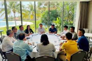 Business meeting room overlooking Sentosa beachfront resort grounds